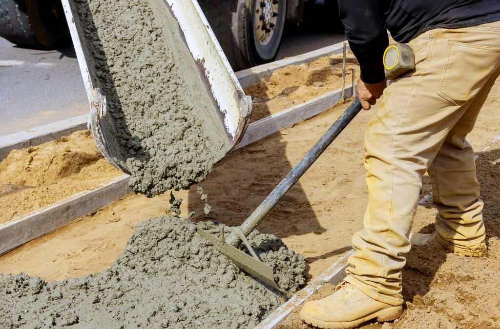 construction-worker-pour-cement-sidewalk-concrete